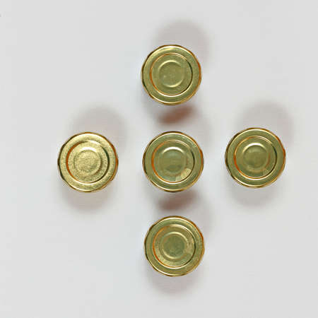 Five Small Jars With Golden Lidsの写真素材