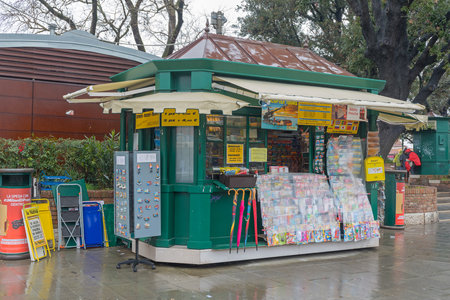 Vence, Italy - February 3, 2018: News Agent Kiosk at Rainy Day in Vence, Italy.のeditorial素材