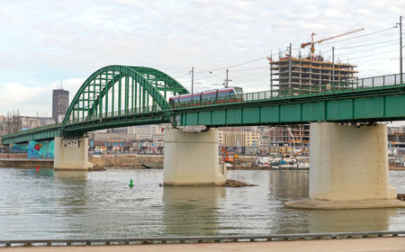Belgrade, Serbia - February 22, 2017: Electric Tram at Old Green Bridge in Belgrade, Serbia.のeditorial素材