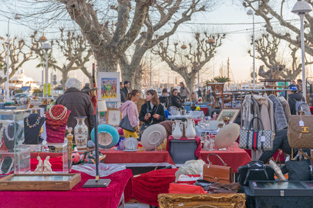 Cannes, France - January 28, 2018: People Shopping at Winter Antique Market in Cannes, France.のeditorial素材