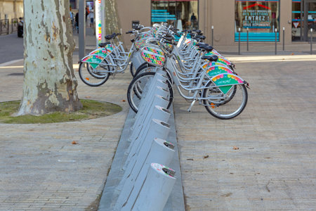Avignon, France - January 30, 2016: Share Ride Bicycles Parked at Street in Avignon, France.のeditorial素材