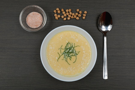 Bowl of Fresh Soup With Herbs Served Top Viewの写真素材