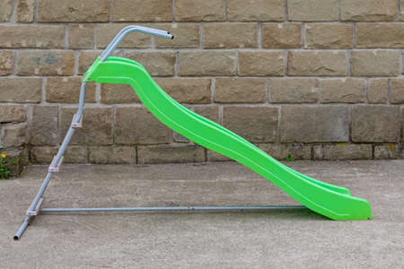 Empty Green Plastic Slide Slope Children Playground