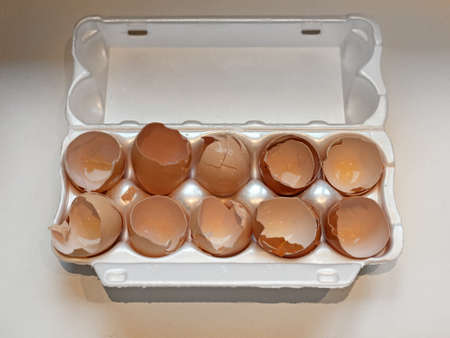 Cracked Eggs Broken Eggshells in Box Package
