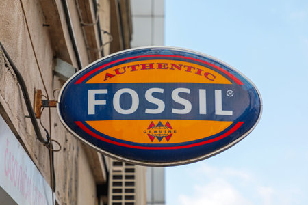 Belgrade, Serbia - February 14, 2021: Oval Fossil Sign at Shop in Belgrade, Serbia.