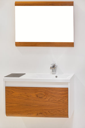 Wooden Mirror and Wall Mounted Cabinet in Bathroomの写真素材