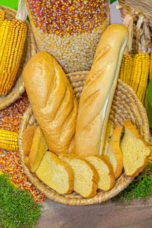 Loaf and Pieces of Bread in Basket Bakery Display