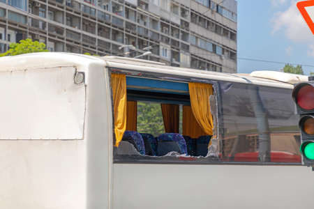 Broken Window Damage at Coach Bus Transport Problemの写真素材