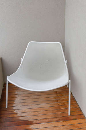 White Mesh Wire Chair at Terrace Deckの写真素材