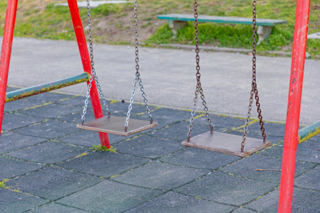 Metal Chain Swings at Kids Playground Outdoors