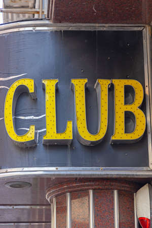 Yellow Sign Club with Led Lights at Black Backgroundの写真素材