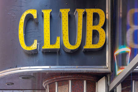 Yellow Sign Club with Led Lights at Black Backgroundの写真素材