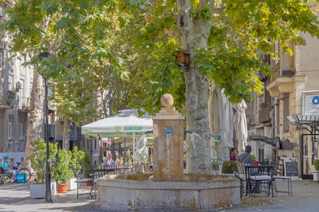 Belgrade, Serbia - September 09, 2021: Water Fountain With Stone Ball at Strahinjica Bana Street at Hot Summer Day.のeditorial素材