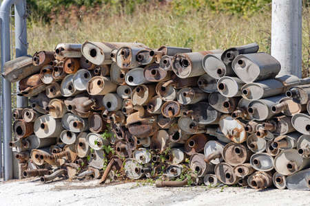 Collection of Damaged Rusty Exhaust Muffler Catalytic Convertersの写真素材