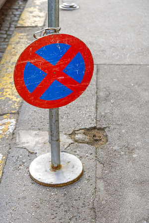 Movable No Parking Sign Column at City Streetの写真素材
