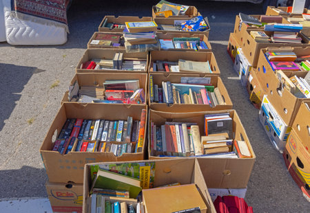Belgrade, Serbia - September 11, 2021: Many Old Books in Boxes for Sale at Flea Market Sunny Day.のeditorial素材