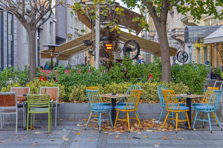 Empty Tables Restaurant Street Terrace at Autumn Day