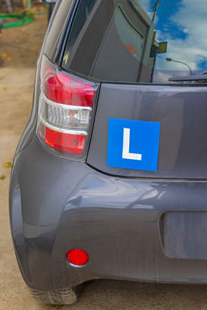 New Driver Blue L Plate Sticker at Small Carの写真素材