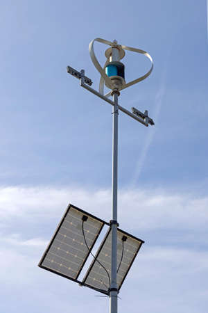 Vertical Axis Wind Turbine With Solar Panels Renewable Energy Generation