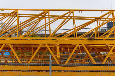 Yellow Tower Crane Lattice Components Construction Site Storageの写真素材