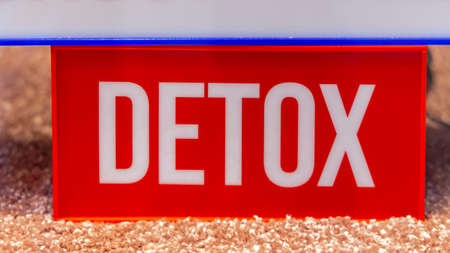 Illuminated Detox Sign in Red Light Boxの写真素材