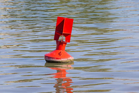 Navigation Buoy Red Special Mark in Riverの写真素材