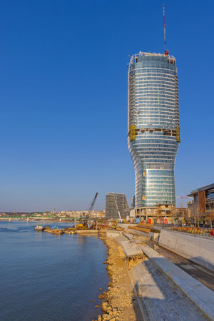 Belgrade, Serbia - November 25, 2021: New Skyscraper Kula Belgrade Waterfront Construction Site Sunny Day.のeditorial素材