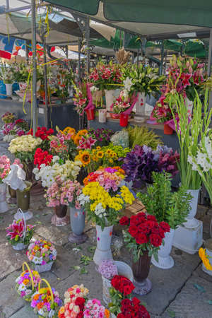 Fresh Flowers in Vases at Farmers Market Florist Stallの写真素材