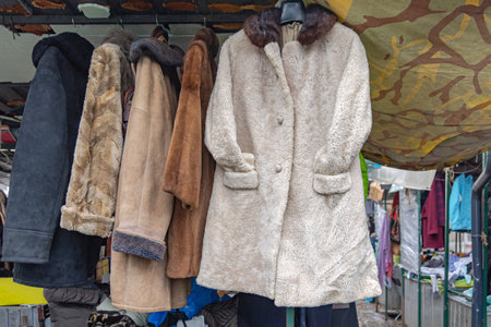 Vintage Sheepskin Winter Coats at Flea Market Stallの写真素材