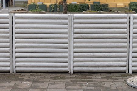 White Wood Logs Wall Structure Fence Divider at Streetの写真素材