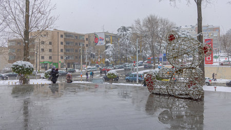 Belgrade, Serbia - January 11, 2022: Few People Outside at Snowy Cold Winter Day Bad Weather in...