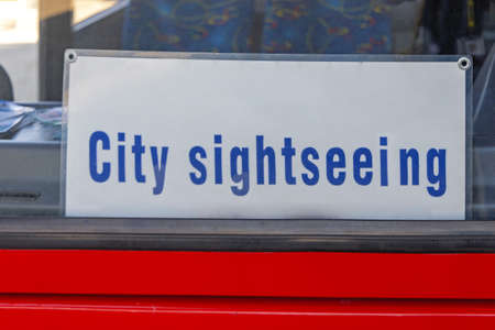 City Sightseeing Tour Sign Board in Tourist Bus Windscreen