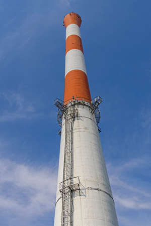 Red and White Tall Chimney Structure at Thermo Plant