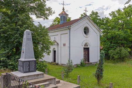 Lenovac, Serbia - June 12, 2022: Serbian Orthodox Church Relics Transfer Temple of Saint Nicholas and Monument Landmark in Lenovac Villageのeditorial素材