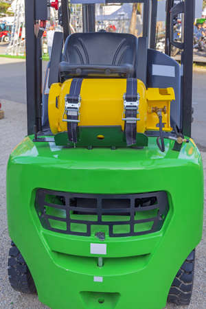 Steel Gas Bottle Tank at Green Forklift Truck