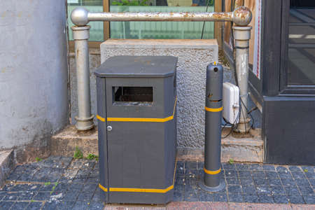 Ashtray and Trash Bin at Street in Cityの写真素材