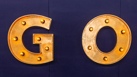 Gold 3d Sign Go With Retro Style Lampsの写真素材