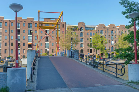Amsterdam, Netherlands - May 14, 2018: Hippopotamus Bridge Hippo Shape Sign Nijlpaardenbrug Over Canal at Plantage Spring Day.のeditorial素材