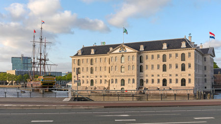 Amsterdam, Netherlands - May 17, 2018: Tallship and National Maritime Museum Building in Capital City Holland.のeditorial素材