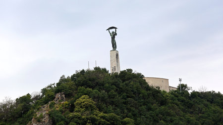 Budapest, Hungary - July 13, 2015: Liberty Statue at Citadella Hill in Capital City Summer Day.のeditorial素材