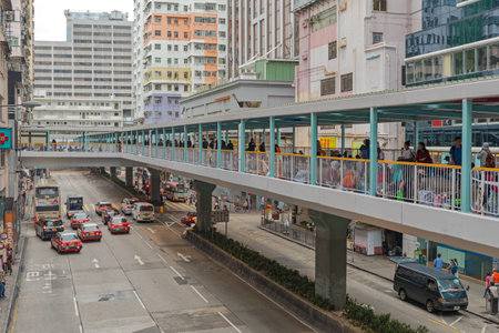 Kowloon, Hong Kong - April 23, 2017: Pedestrian Bridge Over Mong Kok Road Sunday Morning Spring.
