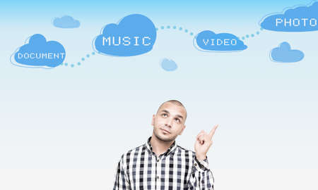 Young man thinking how to use virtual storage.