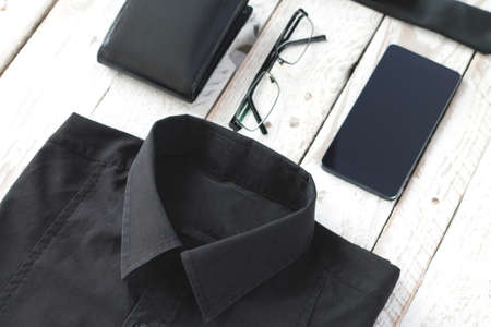 Man's latest trends and fashion accesories. Composition on white wooden boardの写真素材
