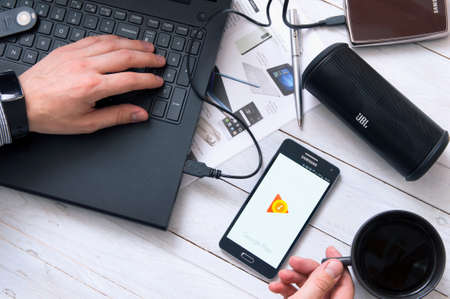 WROCLAW, POLAND- SEPTEMBER 09th, 2016:  Man launches Google Play Music application on Samsung A5....