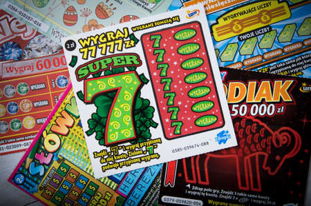 WROCLAW, POLAND -  MARCH 28th, 2017: Stack of scratchcard. Scratchcard is a small card, where areas contain concealed information which can be revealed by scratching off an opaque covering.のeditorial素材