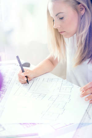 Young architect is making new sketch