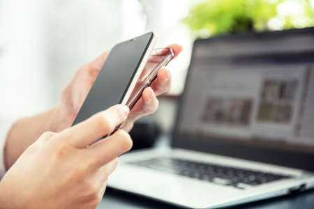 Woman's hands put out smartphone from its silicone case