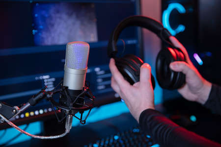 Professional microphone on the streaming or podcast room backgroundの写真素材