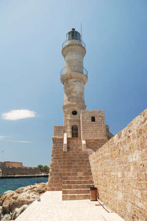 Historic lighthouse in Chania harbour in Crete, Greece.の写真素材