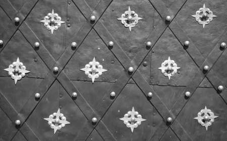 Antique decorated metal door backgroundの写真素材